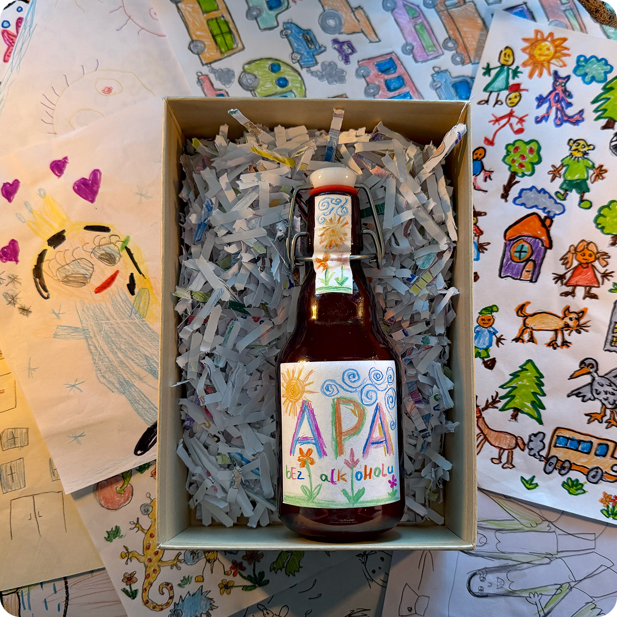 Presentation box filled with fragments of children's drawings